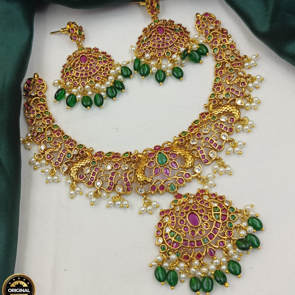 Multi-Strand Festive Pearl Necklace with Central Antique Gold Pendant